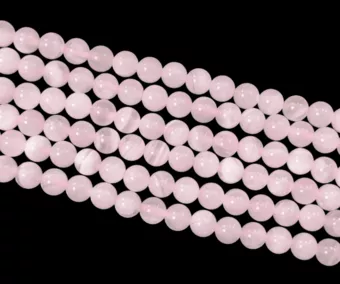 Calcite rosa AA 6mm em fio de 40cm