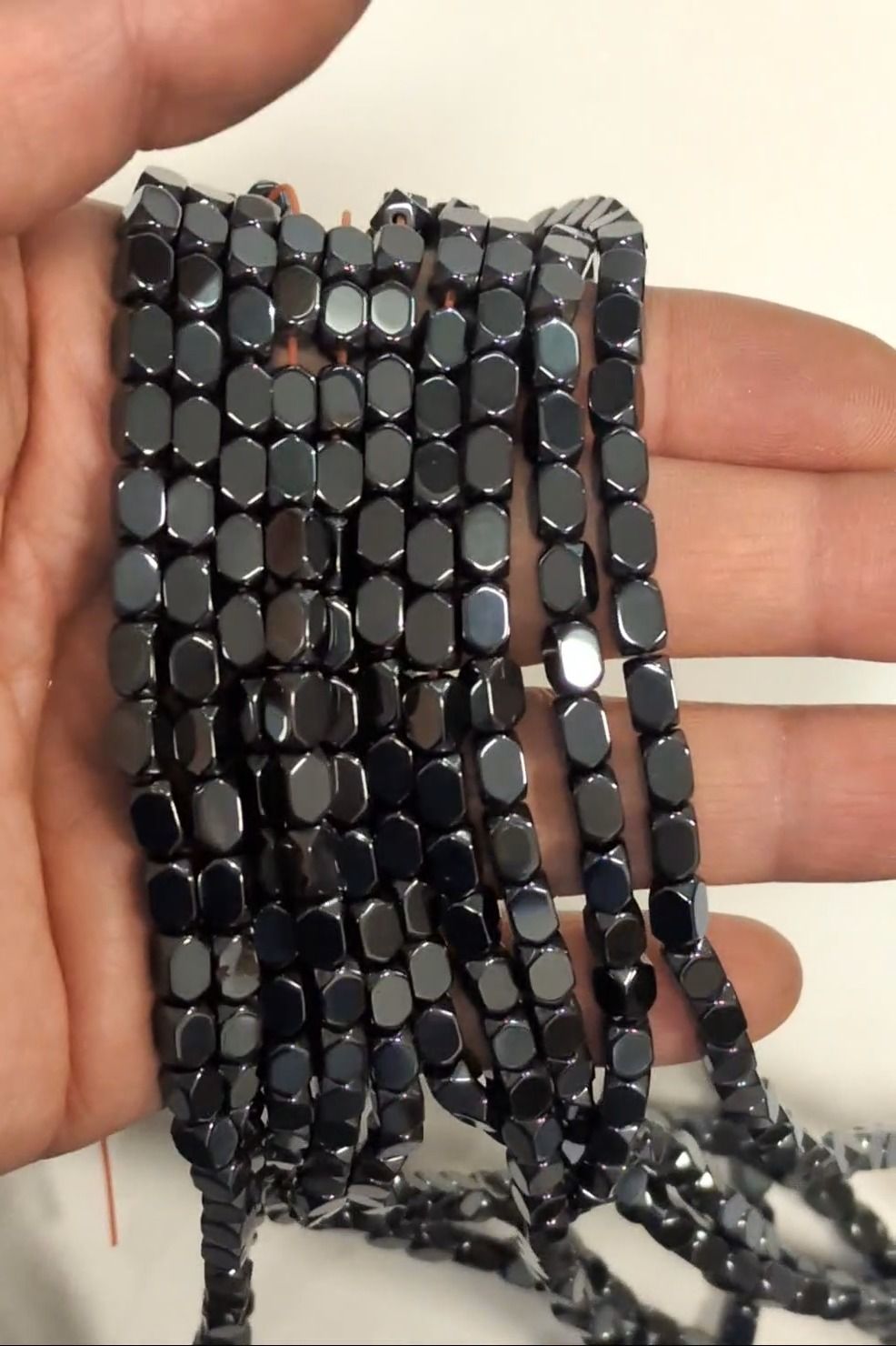 Esferas espaçadoras retangulares arredondadas de hematita – 3,7×5,5 mm